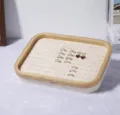 Bamboo jewelry tray with ring slots and heart earrings on a white furry surface - Rectangle (76 Slots) / Beige