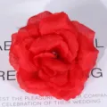 Artificial red silk rose flower head, realistic fabric floral decor for weddings and crafts. - Red