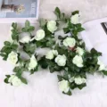 White artificial rose flower vine garland for home wall hanging and ceiling decoration. - White