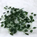 Artificial green ivy vine plant for home wall hanging decor, realistic fake foliage leaves. - Pothos Leaf Wall Hanging