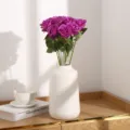 Artificial purple rose bouquet in white ceramic vase, perfect for home decor and wedding setup. - Purple