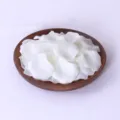 White artificial rose petals in wooden bowl, perfect for wedding decoration and celebration events. - Milk White