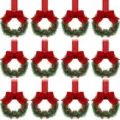 Dettaglio della mini ghirlanda di bacche natalizie con fiocco rosso per le feste. - 12 Pezzi/Confezione / Rosso