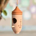Wooden hanging birdhouse for outdoor garden decoration, mini hummingbird nest feeder with natural wood grain. - D-Beechwood