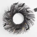 Ghirlanda di Halloween nera con rami, pipistrelli e luci LED per decorazione murale spettrale. - Stile Rotondo