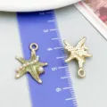 Green enamel starfish alloy pendant with white pearls, shown with a scale ruler - Ocean Pearl Starfish (27701) / 1 Piece (19x15mm) / Green