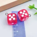 Rose red resin dice charms for DIY jewelry making shown on a ruler for size reference - Square Dice (17228) / 1 Piece (14x14mm)