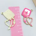 Pink enamel medical heart stethoscope charm for DIY jewelry making, creative nurse gift idea - 1 Piece/Pack (31*27mm)