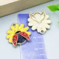 Close-up detail of enamel ladybug charm pendant with ruler for accurate size reference - KC Golden Yellow Enamel Chrysanthemum Ladybug (26999) / 1 Piece (22x21mm) / Yellow