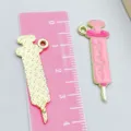 Pink enamel syringe charm for medical DIY jewelry with measurement ruler shown - 1 Piece/Pack (35*13mm)