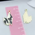 Black and white enamel dragon bird alloy charm for Halloween DIY jewelry making project - 24x14.5mm