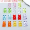 Close-up of 20 colorful transparent acrylic gummy bear charms for DIY jewelry making - Cartoon Bear (27508) / 1 Piece (19x12mm) / Transparent Multicolor
