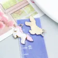 White and pink enamel unicorn charm for DIY jewelry making, front and back view - Pink and White Running Unicorn (9932) / 1 Piece (14x17mm)