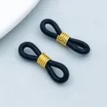 Schwarze rutschfeste Silikon-Brillenschnalle mit goldenem Metallring für DIY-Schmuck - Rutschfeste Silikon-Brillenschnalle (26272) / 1 Stück (21x7mm) / Gold