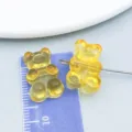 Transparent yellow amber acrylic gummy bear charms for DIY necklace and bracelet jewelry - Cartoon Bear (27505) / 1 Piece (19x12mm) / Transparent Light Orange