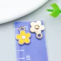 Handmade DIY jewelry accessory featuring a yellow oil-dripped alloy daisy flower charm - Little Daisy (12251)