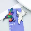 Vibrant enamel hummingbird charms for DIY jewelry making shown with size ruler scale - Colorful Drip Oil Hummingbird (27591)