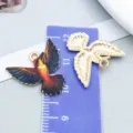 Vibrant colorful oil-drop hummingbird pendant charms for DIY jewelry making and accessories - Spreading Wings Hummingbird (27622)