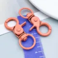 Chiusura a moschettone girevole in lega color corallo per artigianato di gioielli fai da te - Arancione Giallo
