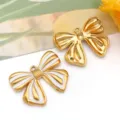Colgantes de lazo de acero inoxidable dorado con esmalte blanco para hacer joyas DIY - 蝴蝶结吊坠(T1630)