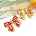 Elegante colgante de lazo de esmalte rojo y dorado para joyas DIY en acero inoxidable - 蝴蝶结吊坠(T1632)