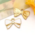 Colgantes con forma de lazo en esmalte blanco y dorado para joyería creativa DIY - 蝴蝶结吊坠(T1641)