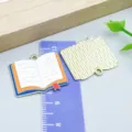 Enamel book shaped charm for DIY jewelry making showing both front and back views - Book Style (27462) / 1 Piece/Pack (22*27mm) / Orange