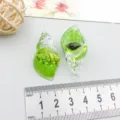 Luminous green resin sea shell pendant for DIY jewelry making with size reference - Green