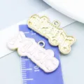 Rosa und goldene Musik-Anhänger aus Legierung mit MUSIC-Schriftzug für DIY-Schmuck - MUSIC Buchstabenplatte (27241) / 1 Stück (14*28mm) / Rosa