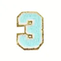 Detail shot of blue chenille number 3 patch with gold glitter border for apparel DIY decor. - Style 3