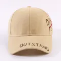 Detailed close-up shot of casual khaki baseball cap featuring English letter print on curved brim. - Dark Khaki