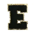 Black and gold glitter chenille letter E patch embroidery detail closeup view for DIY crafts. - Letter E
