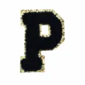 Close up detail view of the black chenille and gold glitter letter P embroidery patch. - Letter P
