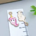 Adorable pink enamel unicorn head charm for DIY jewelry making with gold-tone finish - Unicorn (25167) / 1 Piece (21x9x1mm) / Pink