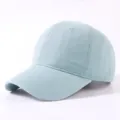 Casual solid light blue cotton baseball cap for men and women, simple curved sun hat. - Blue