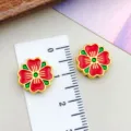 Detailed view of red enamel sakura flower spacer beads for DIY jewelry - Sakura (22506) / 1 Piece/Pack (13x13mm) / Red