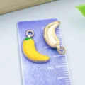 Yellow chili-shaped enamel alloy pendant charm with gold loop for DIY jewelry making - 1 Piece (18x12mm)