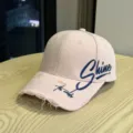 Rosa distressed Baseballcap für Damen, stylischer Sonnenschutz mit gebogenem Schirm. - Rosa