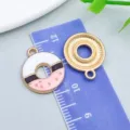 Set of enamel and gold textured donut charms for DIY craft and jewelry making projects - Pink White Enamel Donut (24690)