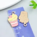 Cute pink and yellow enamel cupcake charm with heart detail for DIY jewelry craft projects - Yellow Pink Enamel Heart Milkshake Cake (24696)