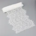 White lace fabric roll detail, 22cm wide, featuring floral eyelash trim for wedding dress and crafts. - White