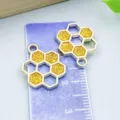 Yellow glitter oil-dripped alloy honeycomb charms for DIY jewelry making and accessories - 1 Piece (19x15mm)