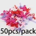 50pcs cinta lazos de rosas 3.5x4cm flores de tela aplicaciones para manualidades y regalos. - 50 Piezas / Colores Mezclados