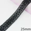 Close-up detail of black lace trim, 25mm width, perfect for gift packaging and DIY crafts. - 25mm Width / Black