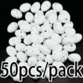 50pcs paquet œufs artificiels en mousse mouchetés pour décoration de bricolage de Pâques. - Blanc