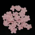 Detail view of 2.5cm pink 5-petal fabric flower patches with pearl center for DIY sewing. - 20 Pieces / Flesh Pink