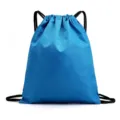 Blue waterproof oxford cloth drawstring backpack with football texture for outdoor sports storage. - Lake Blue