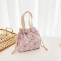 Cute pink canvas drawstring bento bag featuring lovely rabbit and strawberry print for daily use. - Pink Rabbit and Strawberry Drawstring Lunch Bag