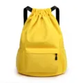 Bright yellow drawstring backpack with front zipper pocket and mesh side pockets for gym travel. - S / Yellow