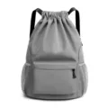 Waterproof gym drawstring backpack with front zipper pocket and mesh side pockets for daily travel. - S / Gray